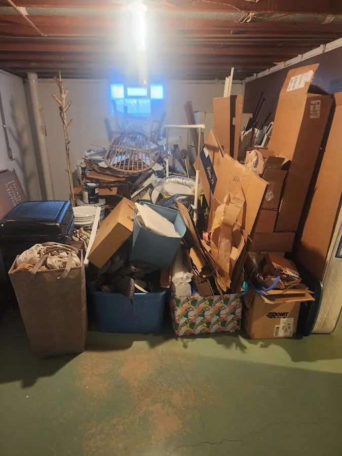 Roll-off dumpster container at job site for 4 Yard Dumpster Rental in Garner